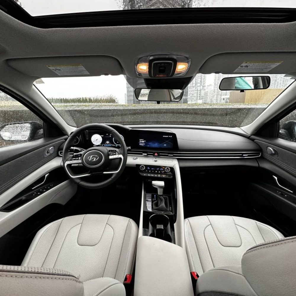 Hyundai car interior with digital dashboard.
